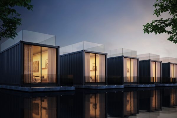 Shipping container hotels by a river