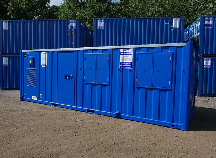 Blue welfare unit with other similar units stacked in the background