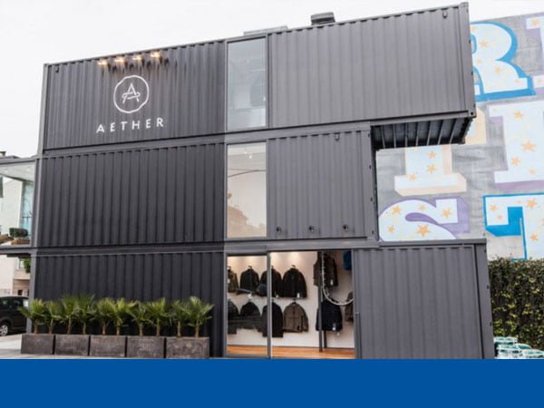 A 3-level shop made of shipping containers