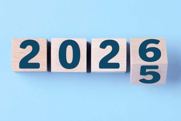 Wooden blocks flipping from 2025 to 2026 against a blue background, representing holiday schedule showing Philspace's Christmas 2025 opening hours