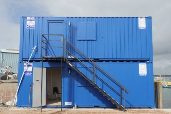 Philspace shipping containers stacked in a building site