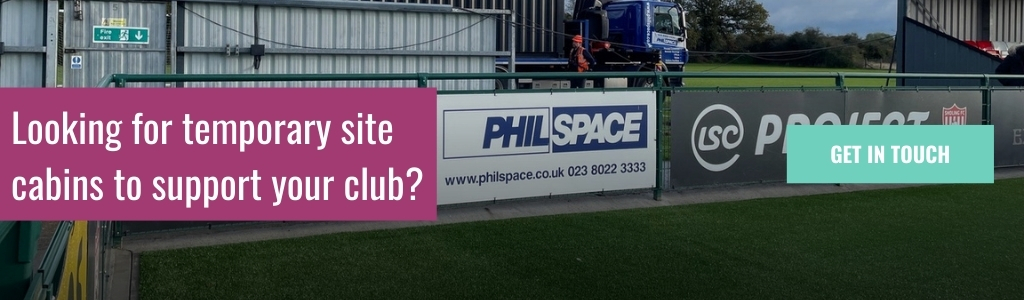 A pitchside banner at Sholing FC promoting Philspace, alongside a callout asking about temporary site cabins for clubs.