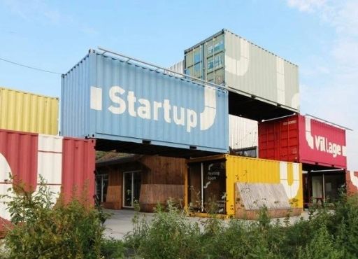 Shipping container village by Julius Taminiau offers space for startups in Amsterdam, courtesy of Dezeen