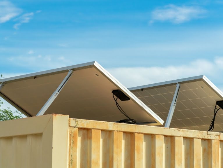 Solar panels on top of a sustainable shipping container