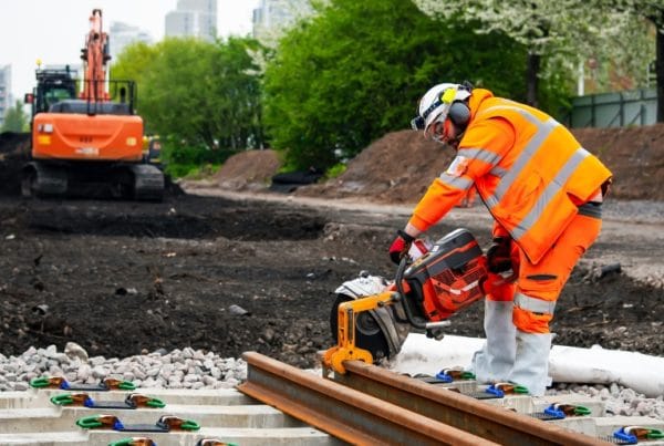 Construction workers on a railroad