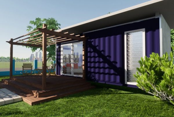 a home, in tropical surroundings, made from a shipping container