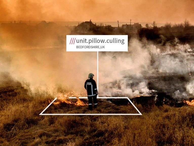the What3Words logo and display, stylised, of how the app works in emergency firefighting situations