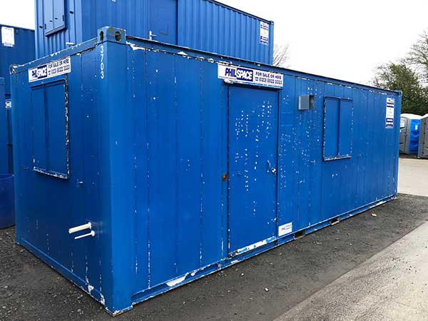 Blue shipping container converted into an open plan mess -used item for sale